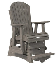 A gray outdoor Adirondack-style rocking chair with a footrest, shown on a plain white background.
