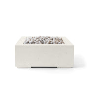 32-inch Alea concrete and limestone fire pit with ivory beach stones on a white background.  