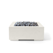 32-inch Alea concrete and limestone fire pit with slate beach stones on a white background.  