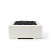 40-inch Alea limestone concrete fire pit with black lava rocks on a white background.  