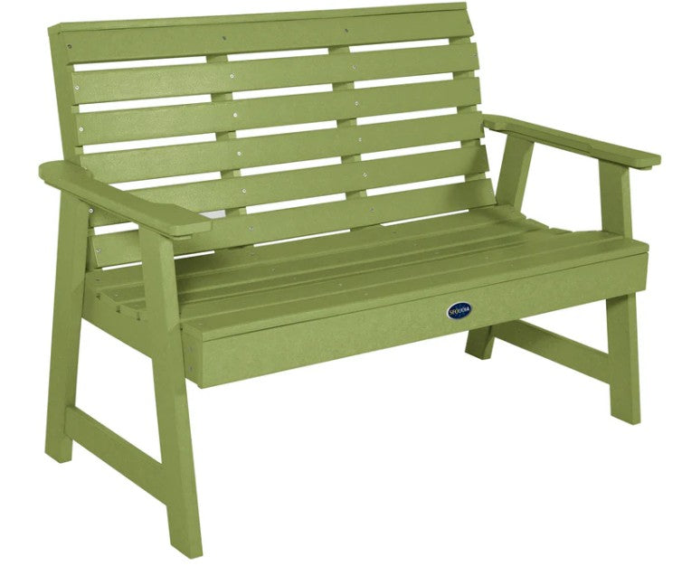 Green bench with a visible brand logo on a white background