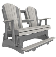 Gray Adirondack glider with a footrest on a white background