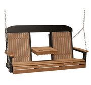 A two-person hanging porch swing bench with a brown slatted seat, matching armrests, and backrests, plus a small matching wooden table in the center. The frame and hanging chains are black with silver metal chains, shown on a plain white background.