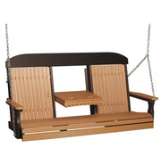A two-person wooden porch swing bench with a small attached side table, featuring light brown wood slats, a dark brown frame, and hanging from silver metal chains against a white background.