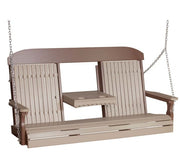 A two-person porch swing bench with a central table, suspended by silver chains. The bench features a warm taupe-brown frame with light beige slatted panels on the backrests and seat.