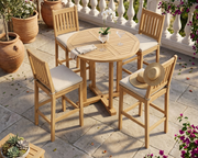 Anderson Teak Bahama 39 inch bar table with 4 Avalon Bar Chairs o n a stone patio.  