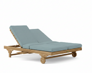 Bel air double sun louger with mineral blue cushions on a white background. 