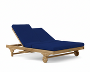 Bel air double sun lounger with true blue cushions on a white background.