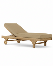 Capri teak lounger with linen sesame on white background.  