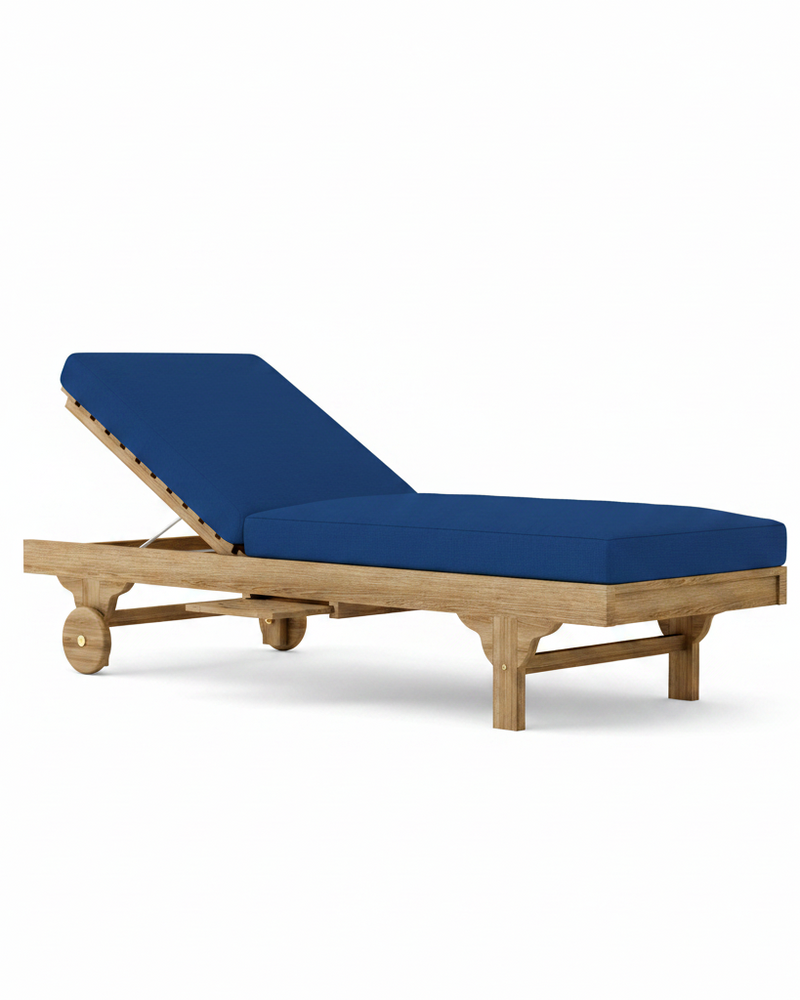Capri teak lounger with pacific blue cushion on white background.