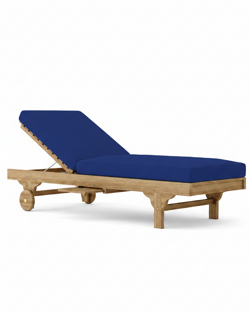 Capri teak lounger with true blue cushion on a white background.