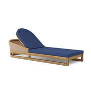 Catania teak lounge chair with navy cushion on white background.  