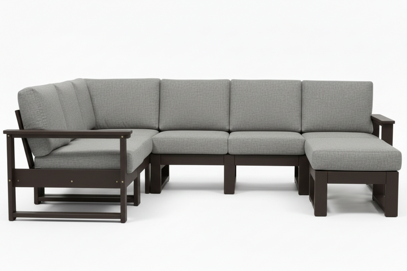 A modern outdoor sectional sofa with a left-facing chaise lounge, upholstered in light gray textured fabric with a dark brown frame, shown against a plain white background.