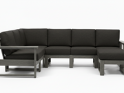 A modern outdoor sectional sofa with dark charcoal gray cushions and a weathered gray frame, shown against a plain white background.