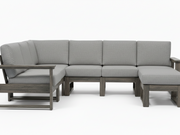 A 5-piece outdoor sectional sofa with light gray textured cushions and a weathered gray-brown wooden frame, shown against a plain white background.