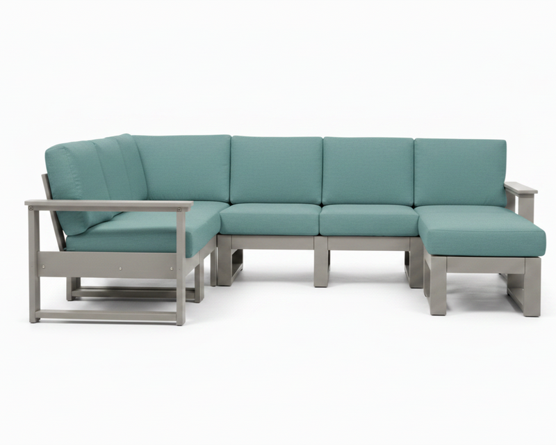 An outdoor sectional sofa with light gray frames and teal cushions, shown from the front against a plain white background.