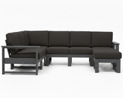 A modern outdoor sectional sofa set with a left-facing chaise lounge, a three-seat sofa, and a right-facing ottoman, all in dark charcoal gray fabric with a matching dark gray frame, shown against a plain white background.