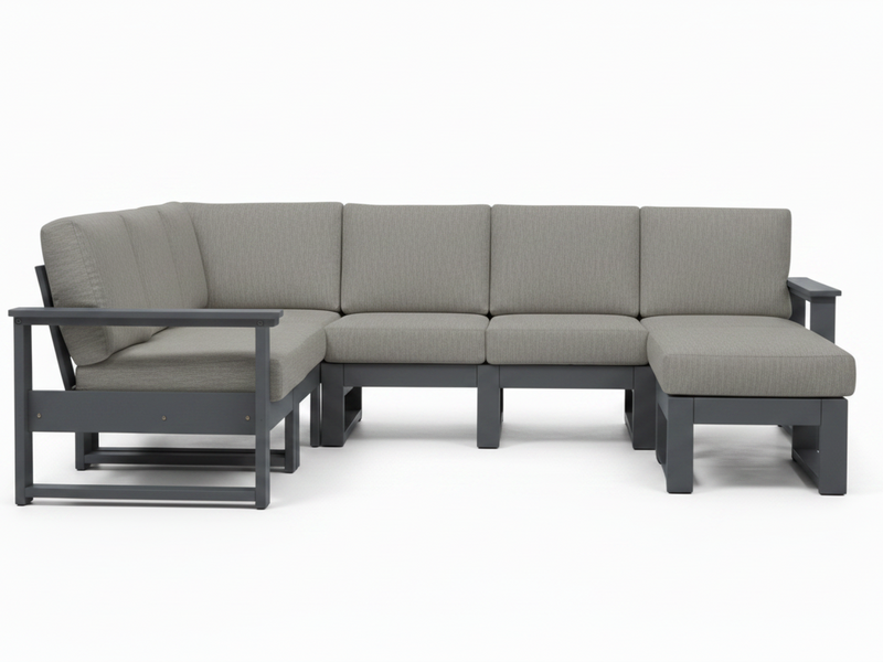 A modern outdoor sectional sofa with a left-facing chaise lounge, upholstered in textured light gray fabric with a dark gray frame, shown against a plain white background.