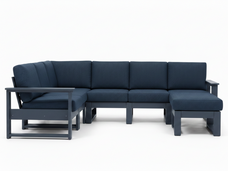 A modern outdoor sectional sofa with a left-facing chaise lounge and right-facing chaise ottoman, upholstered in dark navy blue textured fabric with a dark gray frame, shown against a plain white background.