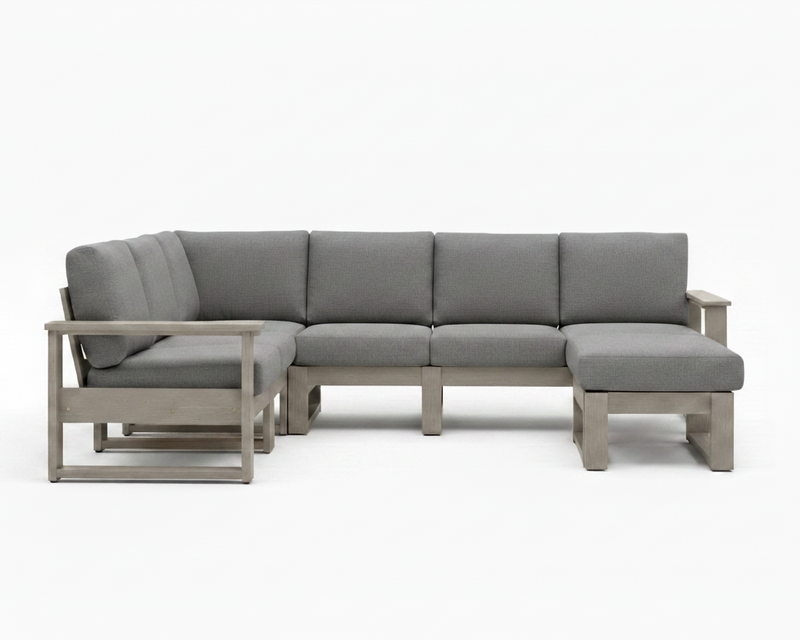 A modern outdoor sectional sofa with light gray fabric cushions and a weathered light gray wood frame, shown against a plain white background.
