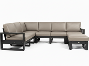 A modern outdoor sectional sofa set with a left-facing chaise lounge and a matching ottoman, upholstered in light taupe leather with a black frame, shown against a plain white background.