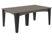 A rectangular outdoor dining table with a weathered gray wood-look top and dark charcoal legs, shown on a plain white background.
