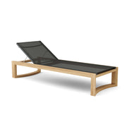 Junus Sun Lounger side front view on a white background.  