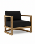 Junus Armchair with black cushion on white background.  