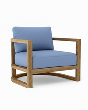 Junus teak armchair with cast ocean cushion on a white background.  