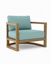 Junus teak armchair with mineral blue cushion on white background.  