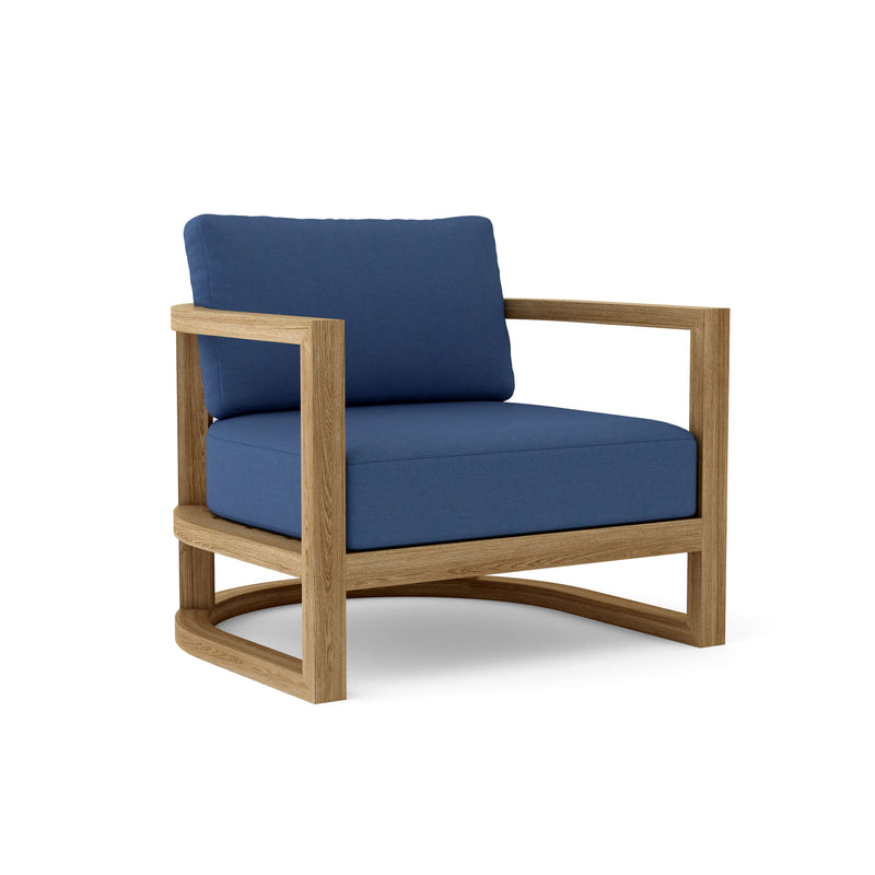 Junus teak armchair with navy cushion on white background.  
