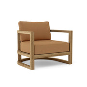 Junus teak armchair with teak cushion on white background.  
