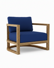 Junus teak armchair with true blue cushion on white background.  