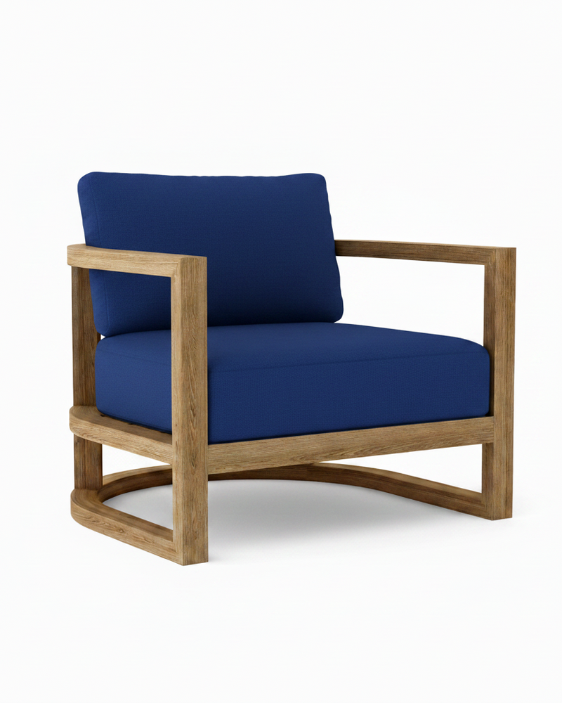 Junus teak armchair with true blue cushion on white background.  