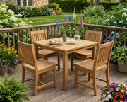 Anderson Teak Lisbon 5-Piece dining set on a wooden porch in a garden setting.  