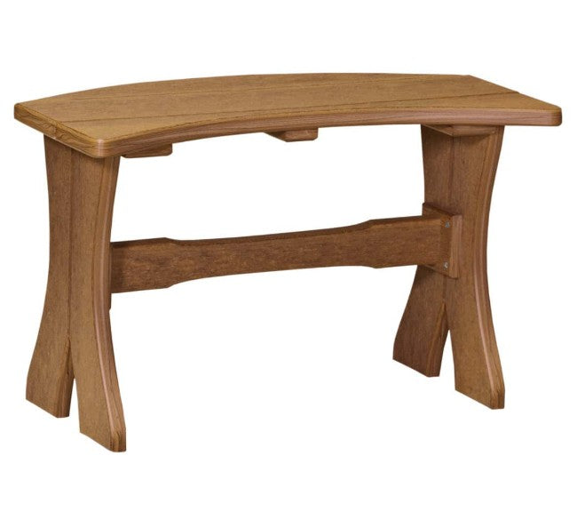 A curved bench with a warm medium-brown finish, featuring a thick seat, angled legs, and a central support beam, shown against a plain white background.