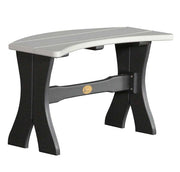 A curved outdoor bench with a light gray slatted seat and a black frame with a small gold brand emblem on the center support, shown on a plain white background.