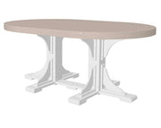 An oval dining table with a light beige wood-look top and a white trestle-style pedestal base, shown on a plain white background.