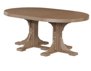 An oval outdoor dining table with a slatted brown top and a matching trestle-style pedestal base, shown on a plain white background.