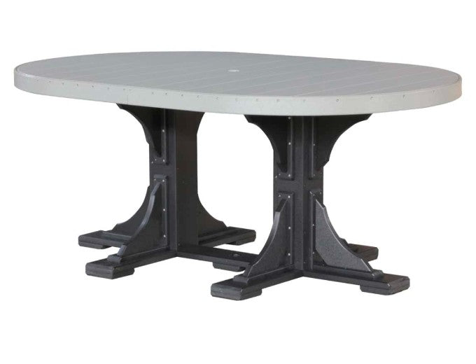 An oval outdoor dining table with a light gray slatted top and a black trestle-style base, shown on a plain white background.