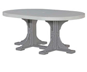 An oval outdoor dining table with a light gray composite-look top and a darker gray trestle-style base, shown on a plain white background.