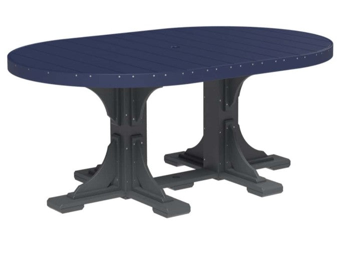 An oval outdoor dining table with a dark navy blue slatted top and a dark gray trestle-style pedestal base, shown on a plain white background.