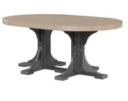 An oval dining table with a light beige wood-look top and a black trestle base, shown against a plain white background.