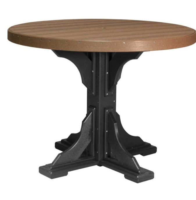 A round outdoor dining table with a brown composite wood-look top and a black metal pedestal base, shown on a plain white background.