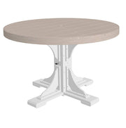 Round outdoor dining table with a light beige slatted top and a white trestle-style pedestal base, shown on a plain white background.