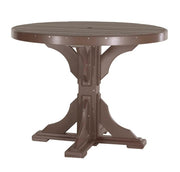 A round outdoor dining table with a trestle-style pedestal base, finished in a dark brown color, shown against a plain white background.