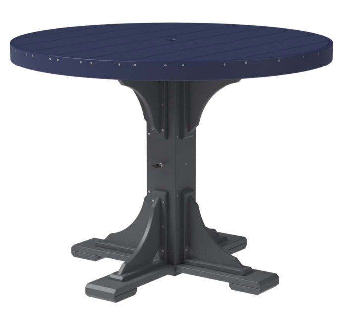 A round outdoor dining table with a dark navy blue slatted top and a dark gray trestle-style pedestal base, shown on a plain white background.