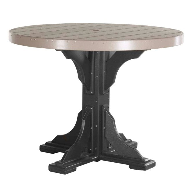 A round outdoor dining table with a light taupe slatted top and a black style pedestal base, shown on a plain white background.