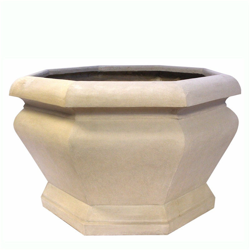 Beige octagonal limestone planter on a white background