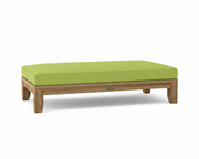 Riviera daybed with macaw cushions on white background.  